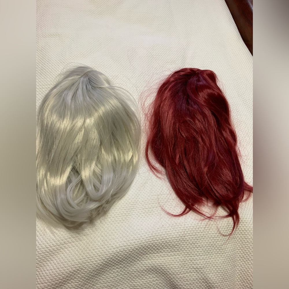 Two costume wigs. White and Red.  Great for Halloween.